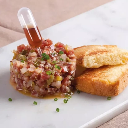 Imatge del Tartar de Fuet del Jardí de la Casa Rull.